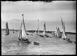 Showing a yachting demonstration on the departure of the eighth volunteer contingent for the Boer War, taken 1 February 1902