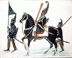 A Sikh Akali-Nihang Sardar, holding a Khanda.