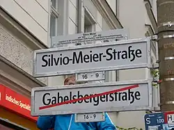 Picture of street sign saying "Silvio-Meier-Straße"
