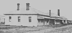 Left to right, Offices, assay building, and store (1897)
