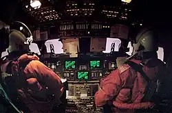 A view of the commander and pilot during reentry on STS-42
