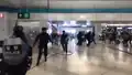 Special Tactical Squad run into Yuen Long Station concourse on July 27 2019