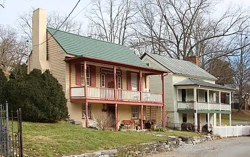 Residential Buildings, 105/107 Spring Street, built circa 1850 with Greek Revival influences