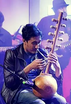 Dinesh Subasinghe Performing a Kora Lute.