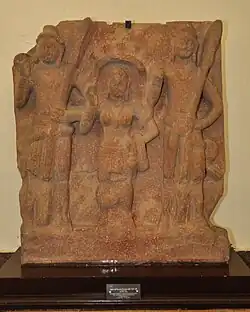 Kushan-era image of Shashthi between Skanda and Vishakha, c. 2nd century CE