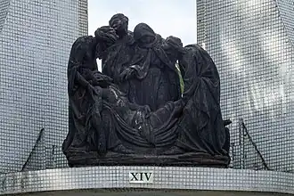 14: Jesus is laid in the tomb.