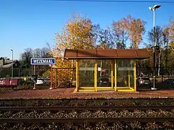 Wezemaal station in 2020 before renovation, with old station sign