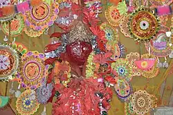 Stone statue of Jain deity Ambika, worshipped as the Hindu goddess Ambika in a modern temple