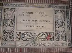 Memorial plaque on original site of Johan Enschede foundry on the Klokhuisplein behind the Sint-Bavokerk.