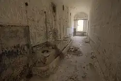 A set of stone latrines in the troop accommodation area