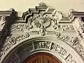Stonework embellishment above a doorway.