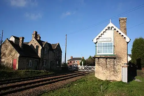 Stow Park level crossing, signal box and closed station. 2006.