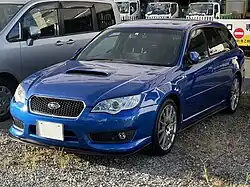 Subaru Legacy tuned by STI, a high-performance variant of the standard Subaru Legacy station wagon. This photo shows the front of the car, which is blue.