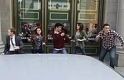 Several people running in different directions, from left to right: Neil Patrick Harris, Alyson Hannigan, Josh Radnor, Cobie Smulders, Jason Segal