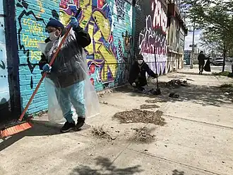 Two street sweepers clearing a pavement in New York City