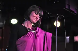 Drewery performing in 2013