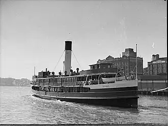 With her enclosed upper deck. Leaving Circular Quay, 1937.
