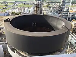 image of Tuned Mass Damper on top of a chimney