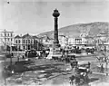 Hejaz Railway – Damascus square and pillar. The gabled building is the Hejaz Railway Line office.