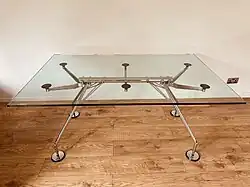 Tecno [it] Nomos table and office desk system by Foster + Partners (1987 award)[45]