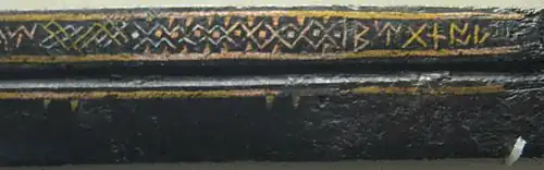 Middle section of a seax, showing inlaid wire decoration