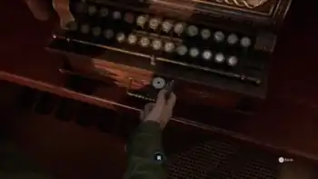 A screenshot of one of The Devil in Me's gameplay mechanics featuring a business card that says "LONNIT ENTERTAINMENT".