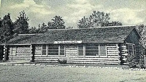 "The Hitching Post" in Whitefish Bay; from a circa 1940s postcard; After Orrin Glidden died in 1933, the Schmock family purchased the resort and later constructed this building as a restaurant. It was managed for a time by their son Tom Schmock.