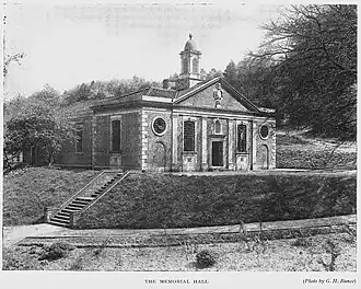 The Memorial Hall at Caterham, opened in 1925 and designed by architect Walter Monckton Keesey, an Old Caterhamian. It was built to honour pupils killed in World War I. Later, the antiquarian booksellers Maggs Bros Ltd enabled its conversion into the school's Maggs Library. [11]