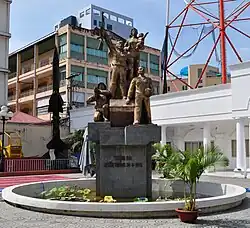A large statue featuring several Vietnamese soldiers