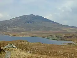 The east end of Loch a' Bhraoin. Taken from the path which follows the Allt Breabaig. Meall an t-Sithe is the good looking hill in the distance. For a similar view but taken 6 months later in Autumn
