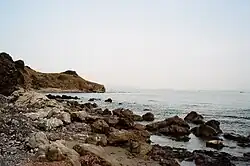 The beach of "Torre La Punta", on the natural reserve "Oasi Blu La Punta".[7]