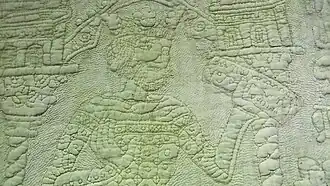 Mark on a light-coloured quilt