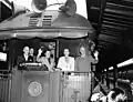 President Harry Truman (Democrat) and his family embark on a whistle-stop tour during his 1948 reelection campaign