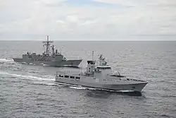 KDB Darulaman alongside USS Rodney M. Davis during CARAT 2014.