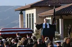The Reverend Dr. Michael H. Wenning delivering a eulogy during a sunset interment service at the Ronald Reagan Presidential Library in Simi Valley, California, on June 11, 2004