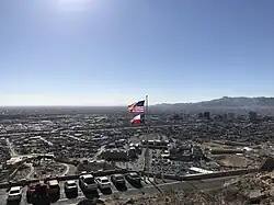 The Texas flag being flown under the US flag in El Paso.