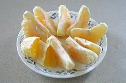 Jamaican tangelo, peeled and sectioned