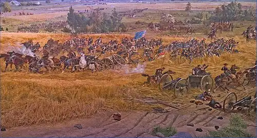 Union infantry and artillery advancing Toward The Angle