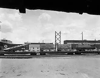 Semi-railer on flatcar service run by the Union Pacific Railroad in 1955