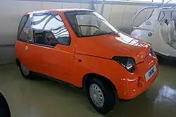 red mini-compact car