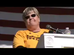 Crouse-Mays at podium