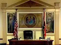 Main courtroom with images of lady justice and state seal of Missouri