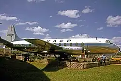 A smaller white-and-blue plane