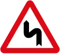 Double bend, first to the left
