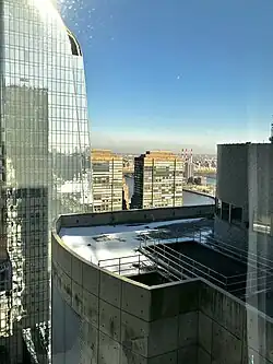 View northside from 29th floor of Millennium Hilton Hotel at One United Nations Plaza. Viewing roof of the US Mission to the UN, with Roosevelt Island and the East River.
