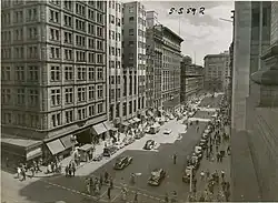 Martin Place in the early 1950s. The building on the corner to the left is the Commercial Travellers Club Building and the 'modern' (c. 1930) twin-wings of the Australia Hotel next to it were demolished in 1971–1972 to make way for the MLC Centre.