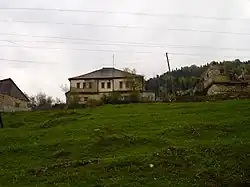 View from the lower neighborhood of upland houses, Volkovija