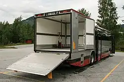 Image 1532003 Volvo 9700S on B12M from Telemark Bilruter, with all doors open. Manual pallet jack is standard equipment for single-person operation. (from Bruck (vehicle))