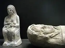 Etrurian statuette of a tightly wrapped baby, possibly consecrated to the gods to avert children's diseases. 3rd–2nd century BC