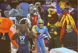 Candid photo of Mascots hanging out at the 2024 WNBA All Star Festivities